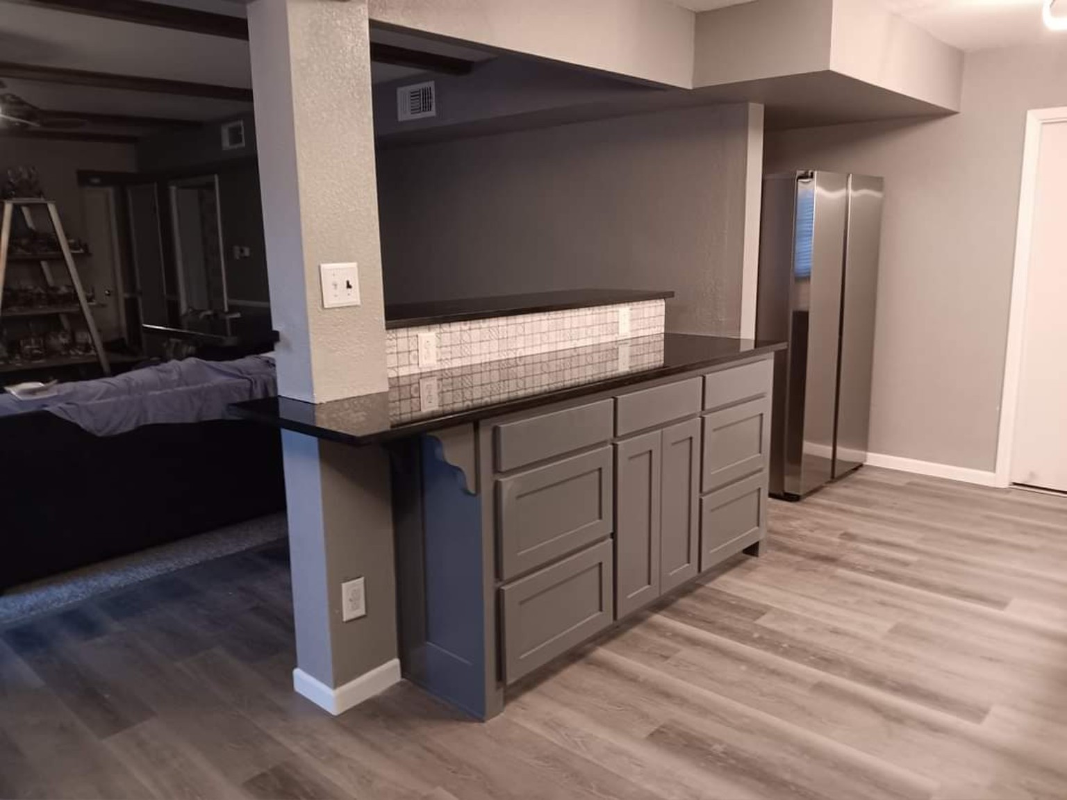 Completed built-in bar and flooring