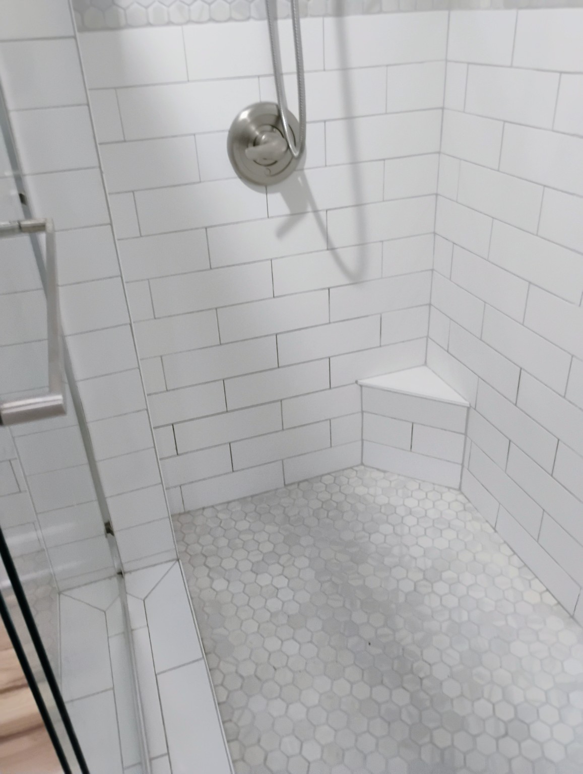 White tile walk-in shower